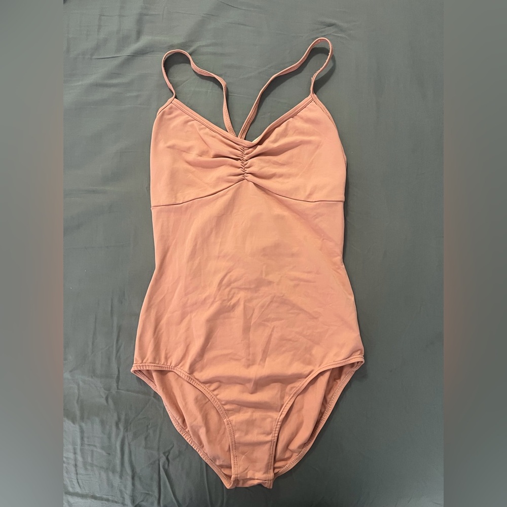 Peach Sansha ballet leotard with cross back detail. Barely worn, like new!
